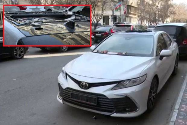 Bakıda binanın fasadından qopan daşlar avtomobilə ciddi ziyan vurdu - VİDEO